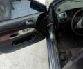 Чорний Міцубісі Lancer, об'ємом двигуна 2 л та пробігом 200 тис. км за 1800 $, фото 1 на Automoto.ua