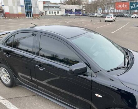 Черный Мицубиси Лансер, объемом двигателя 2 л и пробегом 246 тыс. км за 7500 $, фото 10 на Automoto.ua