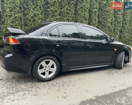 Чорний Міцубісі Lancer, об'ємом двигуна 2 л та пробігом 69 тис. км за 6200 $, фото 7 на Automoto.ua