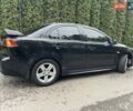 Чорний Міцубісі Lancer, об'ємом двигуна 2 л та пробігом 69 тис. км за 6200 $, фото 7 на Automoto.ua