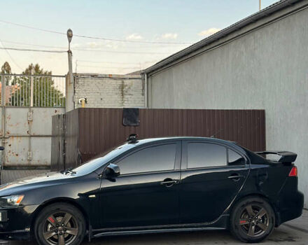 Чорний Міцубісі Lancer, об'ємом двигуна 2 л та пробігом 256 тис. км за 5500 $, фото 2 на Automoto.ua