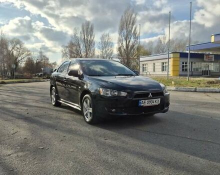 Черный Мицубиси Лансер, объемом двигателя 2 л и пробегом 224 тыс. км за 7000 $, фото 9 на Automoto.ua