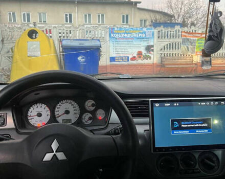 Черный Мицубиси Лансер, объемом двигателя 1.6 л и пробегом 180 тыс. км за 3499 $, фото 16 на Automoto.ua