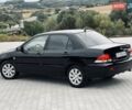 Чорний Міцубісі Lancer, об'ємом двигуна 1.6 л та пробігом 243 тис. км за 4950 $, фото 27 на Automoto.ua