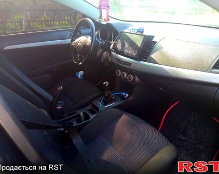 Чорний Міцубісі Lancer, об'ємом двигуна 2 л та пробігом 180 тис. км за 7300 $, фото 7 на Automoto.ua