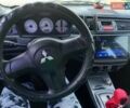 Черный Мицубиси Лансер, объемом двигателя 1.6 л и пробегом 320 тыс. км за 4500 $, фото 8 на Automoto.ua