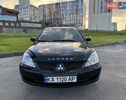 Черный Мицубиси Лансер, объемом двигателя 1.58 л и пробегом 237 тыс. км за 3950 $, фото 3 на Automoto.ua