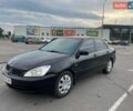 Чорний Міцубісі Lancer, об'ємом двигуна 1.58 л та пробігом 295 тис. км за 2950 $, фото 1 на Automoto.ua