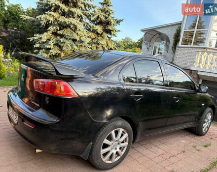 Черный Мицубиси Лансер, объемом двигателя 1.5 л и пробегом 111 тыс. км за 7500 $, фото 20 на Automoto.ua