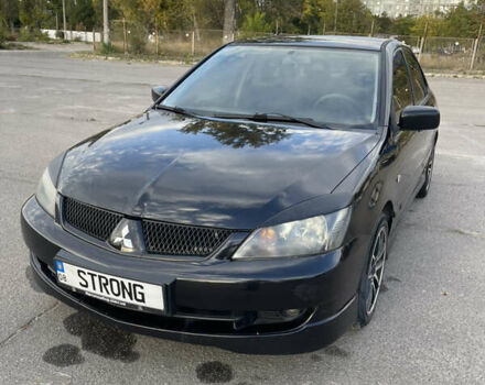 Чорний Міцубісі Lancer, об'ємом двигуна 2 л та пробігом 280 тис. км за 4600 $, фото 2 на Automoto.ua