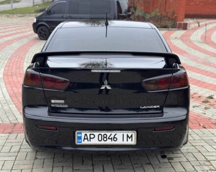 Черный Мицубиси Лансер, объемом двигателя 2 л и пробегом 217 тыс. км за 5500 $, фото 6 на Automoto.ua