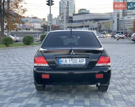 Чорний Міцубісі Lancer, об'ємом двигуна 1.58 л та пробігом 237 тис. км за 4300 $, фото 3 на Automoto.ua
