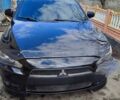 Чорний Міцубісі Lancer, об'ємом двигуна 2 л та пробігом 191 тис. км за 6500 $, фото 1 на Automoto.ua