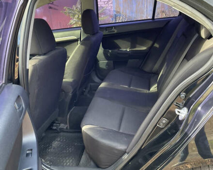 Чорний Міцубісі Lancer, об'ємом двигуна 1.5 л та пробігом 150 тис. км за 6500 $, фото 11 на Automoto.ua