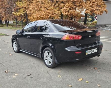 Черный Мицубиси Лансер, объемом двигателя 2 л и пробегом 115 тыс. км за 5000 $, фото 5 на Automoto.ua