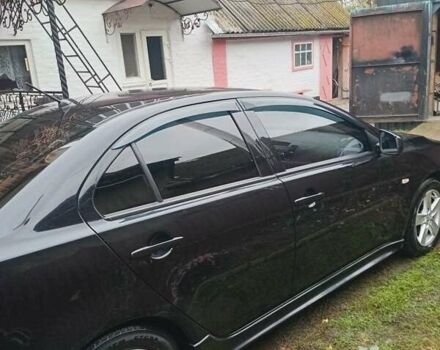 Чорний Міцубісі Lancer, об'ємом двигуна 2 л та пробігом 273 тис. км за 7100 $, фото 4 на Automoto.ua