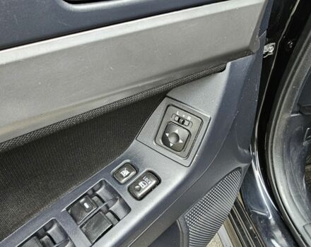 Черный Мицубиси Лансер, объемом двигателя 2 л и пробегом 115 тыс. км за 5000 $, фото 18 на Automoto.ua