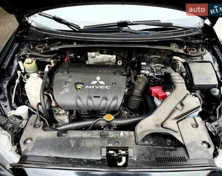 Чорний Міцубісі Lancer, об'ємом двигуна 2 л та пробігом 69 тис. км за 5700 $, фото 10 на Automoto.ua