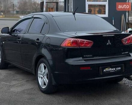 Черный Мицубиси Лансер, объемом двигателя 1.5 л и пробегом 245 тыс. км за 4499 $, фото 2 на Automoto.ua