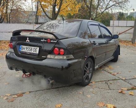 Мицубиси Лансер 2007 в Южноукраинске на Automoto.ua Черный Мицубиси Лансер, объемом двигателя 2 л и пробегом 161 тыс. км за 4600 $, фото 4 на Automoto.ua