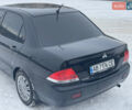 Чорний Міцубісі Lancer, об'ємом двигуна 1.58 л та пробігом 199 тис. км за 4400 $, фото 3 на Automoto.ua