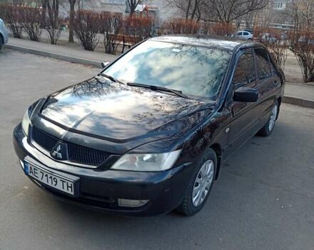 Чорний Міцубісі Lancer, об'ємом двигуна 1.6 л та пробігом 296 тис. км за 4500 $, фото 1 на Automoto.ua