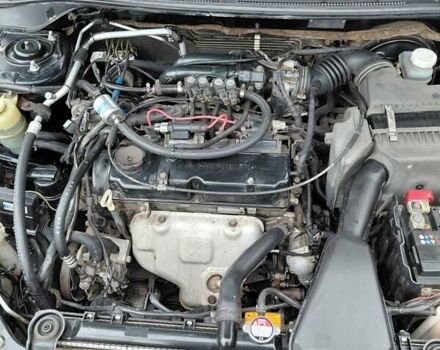 Чорний Міцубісі Lancer, об'ємом двигуна 1.58 л та пробігом 201 тис. км за 4500 $, фото 7 на Automoto.ua