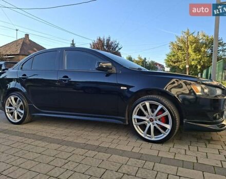 Мицубиси Лансер 2007 в Ужгороде на Automoto.ua Черный Мицубиси Лансер, объемом двигателя 2 л и пробегом 256 тыс. км за 7200 $, фото 9 на Automoto.ua
