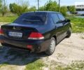 Чорний Міцубісі Lancer, об'ємом двигуна 1.6 л та пробігом 283 тис. км за 3999 $, фото 8 на Automoto.ua