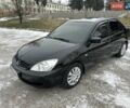 Чорний Міцубісі Lancer, об'ємом двигуна 1.6 л та пробігом 160 тис. км за 4600 $, фото 22 на Automoto.ua