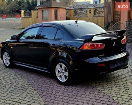 Чорний Міцубісі Lancer, об'ємом двигуна 2 л та пробігом 260 тис. км за 6555 $, фото 11 на Automoto.ua