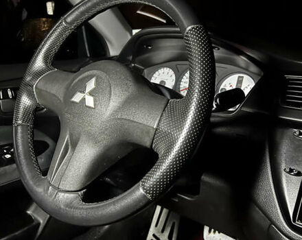 Черный Мицубиси Лансер, объемом двигателя 1.6 л и пробегом 211 тыс. км за 5700 $, фото 36 на Automoto.ua