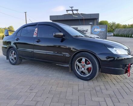 Чорний Міцубісі Lancer, об'ємом двигуна 1.6 л та пробігом 3 тис. км за 4500 $, фото 1 на Automoto.ua