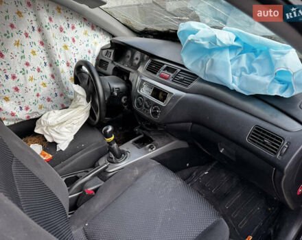 Черный Мицубиси Лансер, объемом двигателя 1.58 л и пробегом 160 тыс. км за 1299 $, фото 1 на Automoto.ua