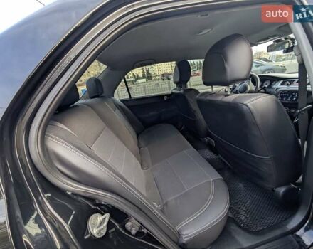 Чорний Міцубісі Lancer, об'ємом двигуна 2 л та пробігом 152 тис. км за 5500 $, фото 11 на Automoto.ua