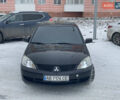 Чорний Міцубісі Lancer, об'ємом двигуна 1.58 л та пробігом 199 тис. км за 4400 $, фото 1 на Automoto.ua