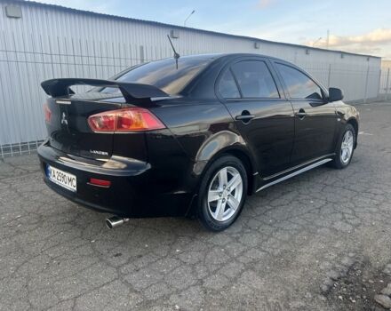 Черный Мицубиси Лансер, объемом двигателя 2 л и пробегом 170 тыс. км за 7900 $, фото 20 на Automoto.ua