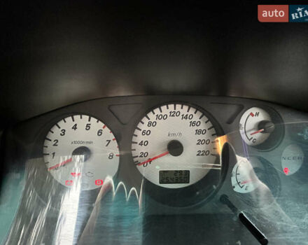 Черный Мицубиси Лансер, объемом двигателя 1.58 л и пробегом 254 тыс. км за 5000 $, фото 24 на Automoto.ua