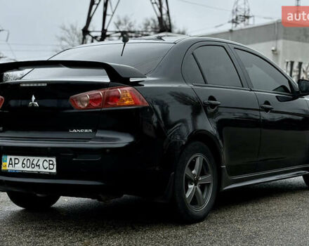 Черный Мицубиси Лансер, объемом двигателя 2 л и пробегом 215 тыс. км за 5500 $, фото 7 на Automoto.ua