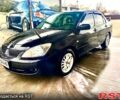 Чорний Міцубісі Lancer, об'ємом двигуна 1.6 л та пробігом 300 тис. км за 4500 $, фото 1 на Automoto.ua