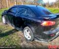 Чорний Міцубісі Lancer, об'ємом двигуна 2 л та пробігом 180 тис. км за 7300 $, фото 2 на Automoto.ua