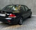 Чорний Міцубісі Lancer, об'ємом двигуна 1.58 л та пробігом 135 тис. км за 4100 $, фото 3 на Automoto.ua