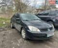 Чорний Міцубісі Lancer, об'ємом двигуна 1.6 л та пробігом 260 тис. км за 3050 $, фото 1 на Automoto.ua