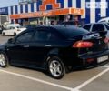 Чорний Міцубісі Lancer, об'ємом двигуна 2 л та пробігом 223 тис. км за 6100 $, фото 2 на Automoto.ua