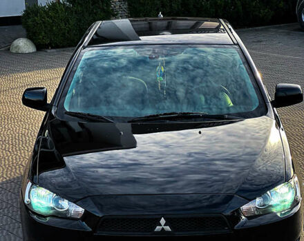 Черный Мицубиси Лансер, объемом двигателя 2 л и пробегом 333 тыс. км за 7300 $, фото 12 на Automoto.ua