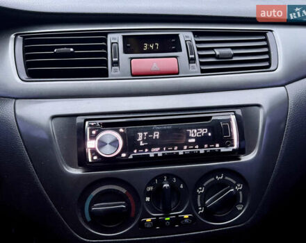 Чорний Міцубісі Lancer, об'ємом двигуна 1.6 л та пробігом 303 тис. км за 4350 $, фото 27 на Automoto.ua