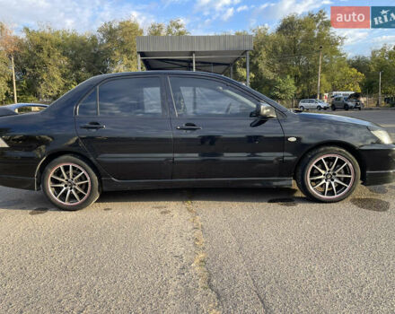 Чорний Міцубісі Lancer, об'ємом двигуна 2 л та пробігом 280 тис. км за 4600 $, фото 14 на Automoto.ua