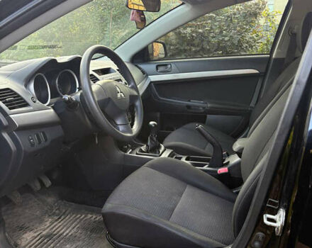 Черный Мицубиси Лансер, объемом двигателя 1.5 л и пробегом 111 тыс. км за 7500 $, фото 15 на Automoto.ua