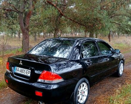 Чорний Міцубісі Lancer, об'ємом двигуна 1.6 л та пробігом 240 тис. км за 4700 $, фото 5 на Automoto.ua