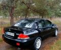 Чорний Міцубісі Lancer, об'ємом двигуна 1.6 л та пробігом 240 тис. км за 4700 $, фото 5 на Automoto.ua